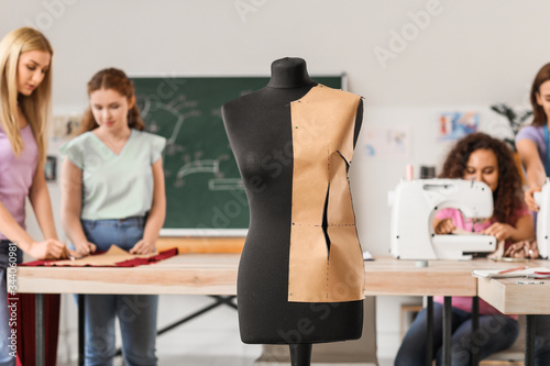 Young women during tailor's...