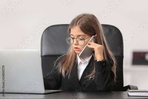 Little businesswoman talkin...