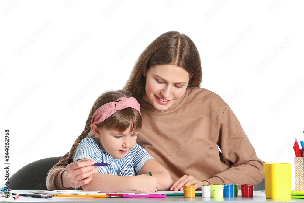 Drawing teacher giving private art lessons to little girl on white background Drawing teacher giving private art lessons to little girl on white background