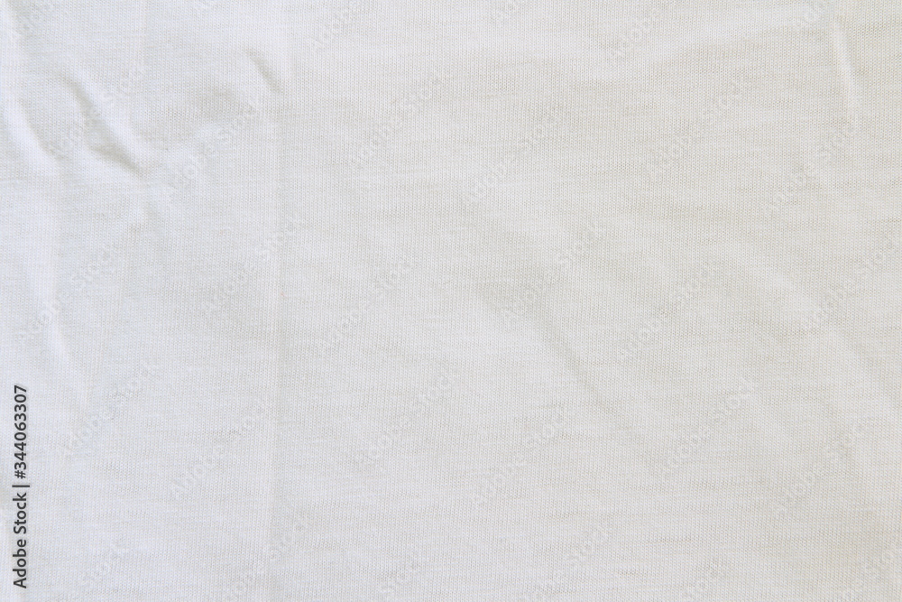 Crumpled white linen fabric cotton for wallpaper design. Brown weave cotton background texture.
