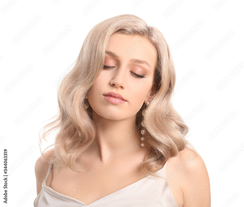 Young blonde with beautiful hair on white background Young blonde with beautiful hair on white background