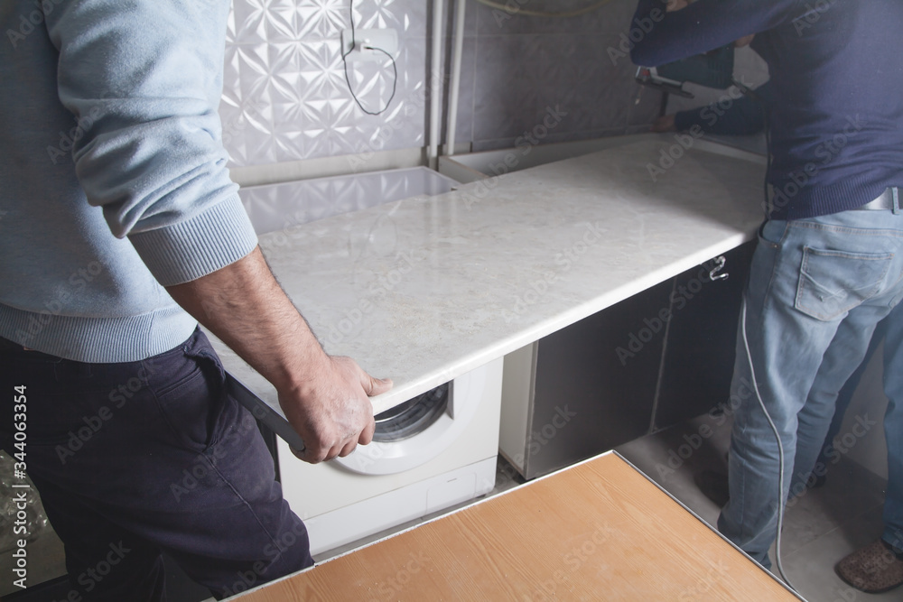Installation of modern kitchen furniture. Installation of modern kitchen furniture.