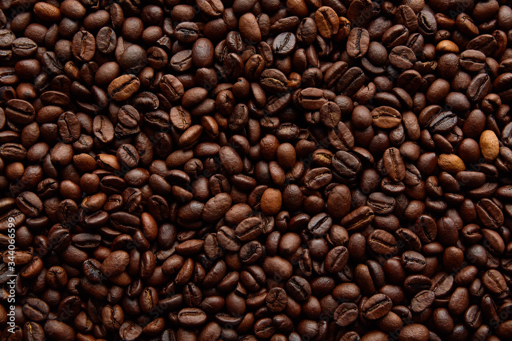 Coffee beans background. Background of roasted coffee beans Coffee beans background. Background of roasted coffee beans