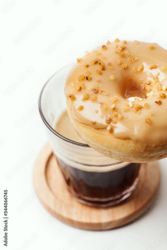 Glass of coffee and donut Glass of coffee and donut