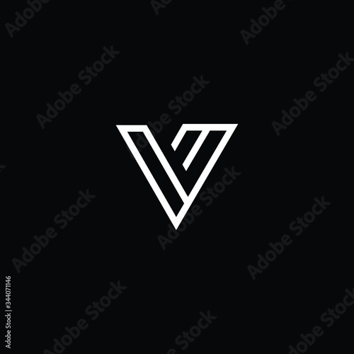 Minimal elegant monogram art logo. Outstanding professional trendy awesome artistic V VV VM MV initial based Alphabet icon logo. Premium Business logo White color on black background