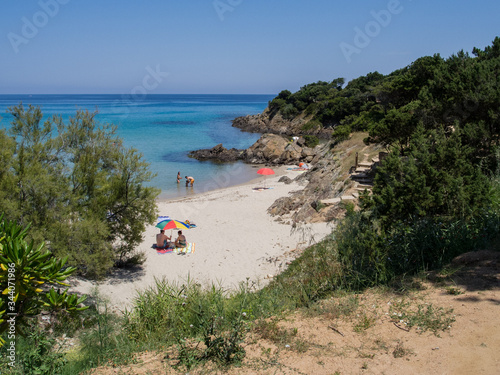 Solenzara, Corsica - June 2013: Relaxing on the beach photo