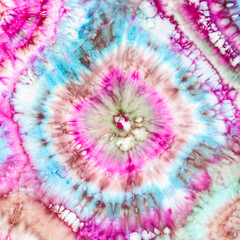 detail of abstract bright ornament in tie-dye batik technique handpainted on silk head scarf