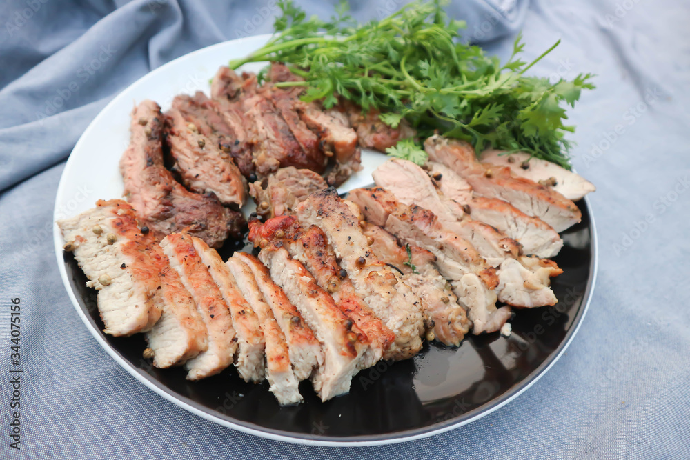 grilled pork , pork steak and beef steak grilled pork , pork steak and beef steak