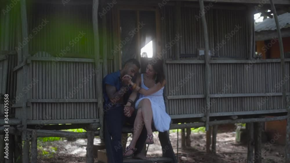 couple in love loving each other in a treehouse couple in love loving each other in a treehouse