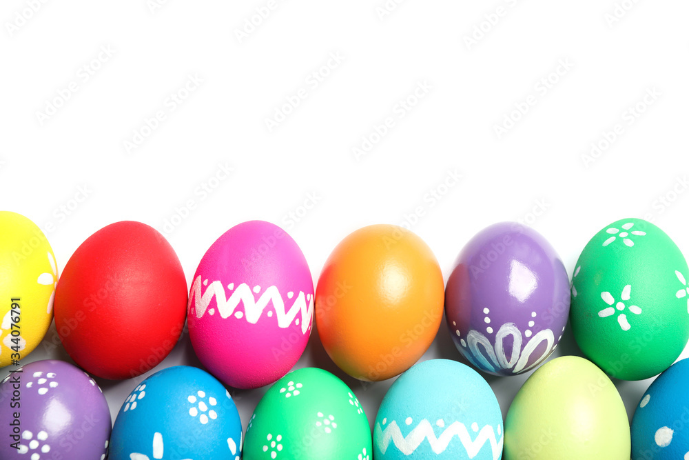 Colorful Easter eggs with different patterns isolated on white, top view