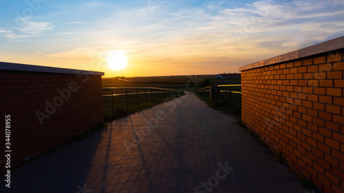 A view of a brick bridge in Hortobagy Hungary at sunset. © majorstockphoto