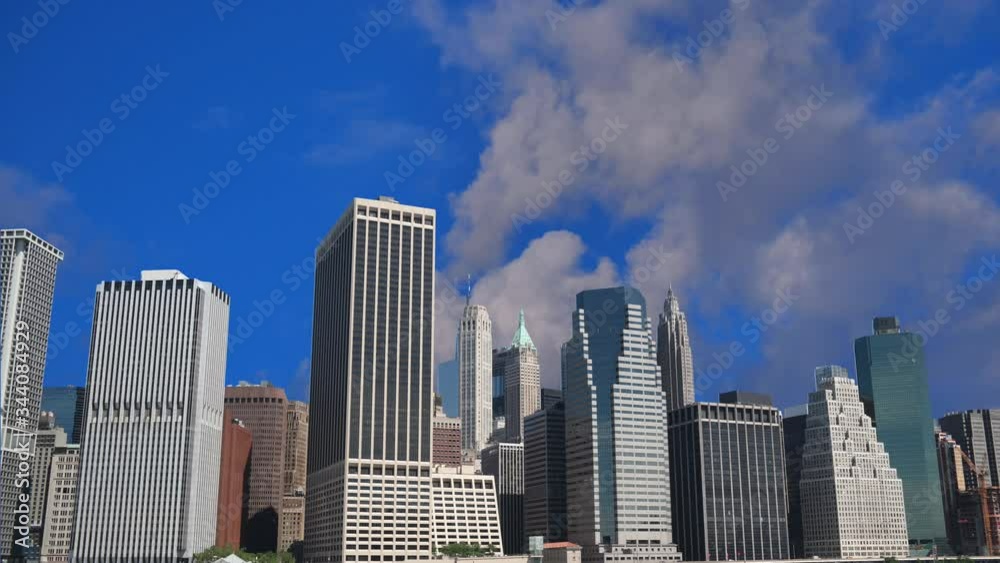 Time lapse shot of new york city skyline and running clouds in blue sky Time lapse shot of new york city skyline and running clouds in blue sky