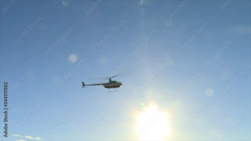 helicopter flying through the farmland sky helicopter flying through the farmland sky