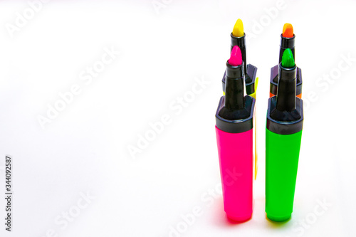 Colorful markers on white background, a lot of colored markers on white background, photo of markers for drawing different colors. 