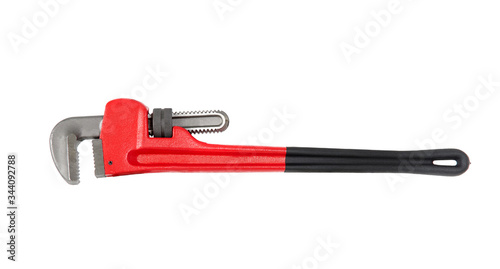 Adjustable pipe wrench tool on white background photo