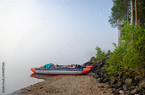 Russia, Republic of Karelia, Tunguda river, smoke on the water photo