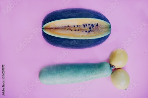 Assortment of phallic and yonic fruits and vegetables with colorful bright background.