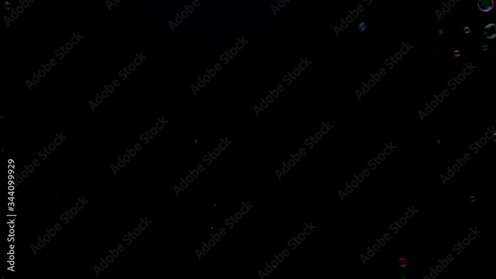 Group of Rainbow bubble floating on black background Group of Rainbow bubble floating on black background