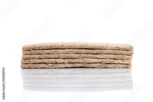 Stack of grain crisp bread isolated on a white background.