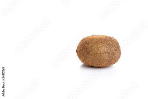 Organic fresh whole kiwi isolated over white background