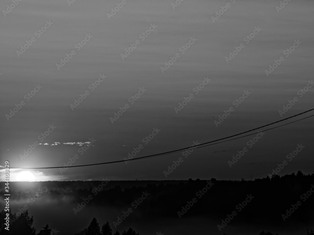 fog over the forest at sunset in summer, Russia fog over the forest at sunset in summer, Russia