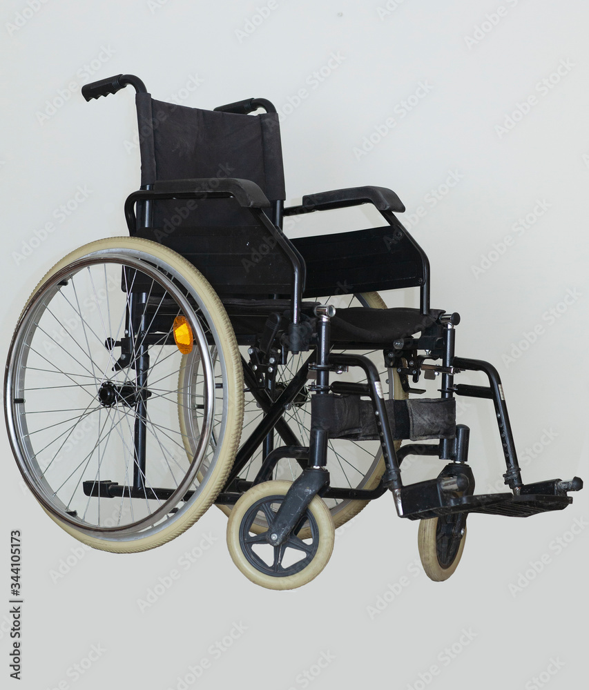 The image of wheelchair in background.