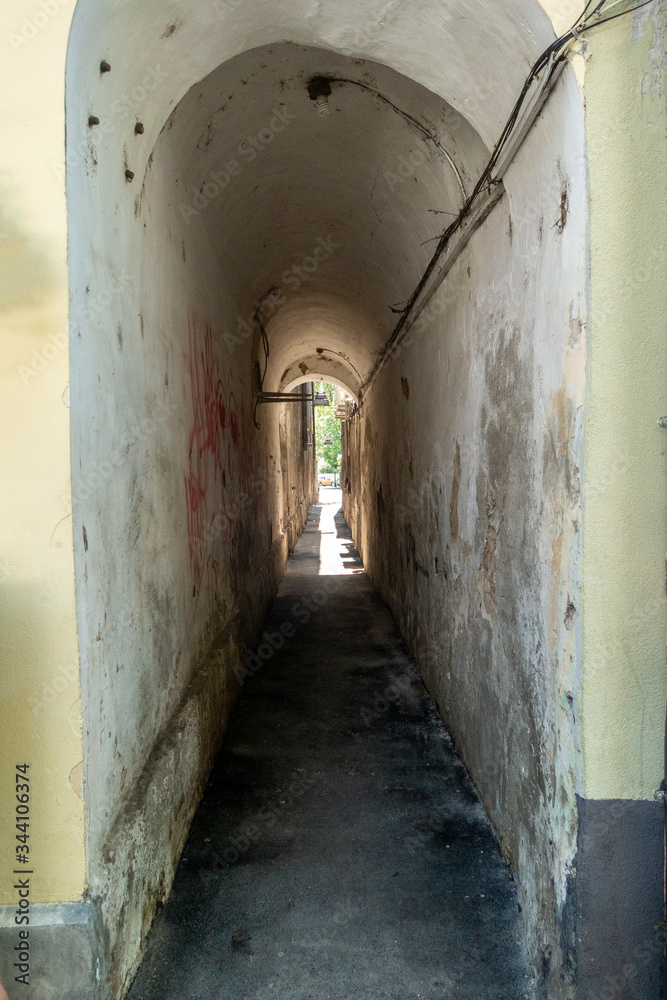Fototapeta premium Narrow street in Bistrita Nasaud County, Romania