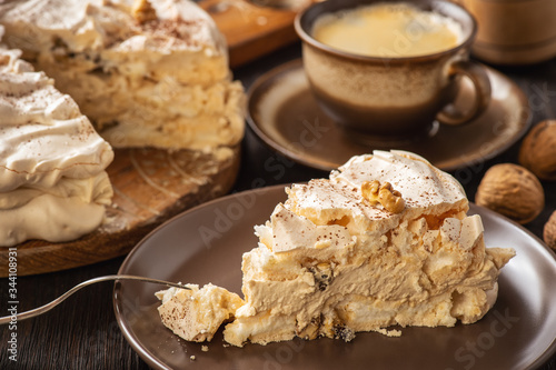 Homemade meringue walnut  cake with coffee mascarpone cream.