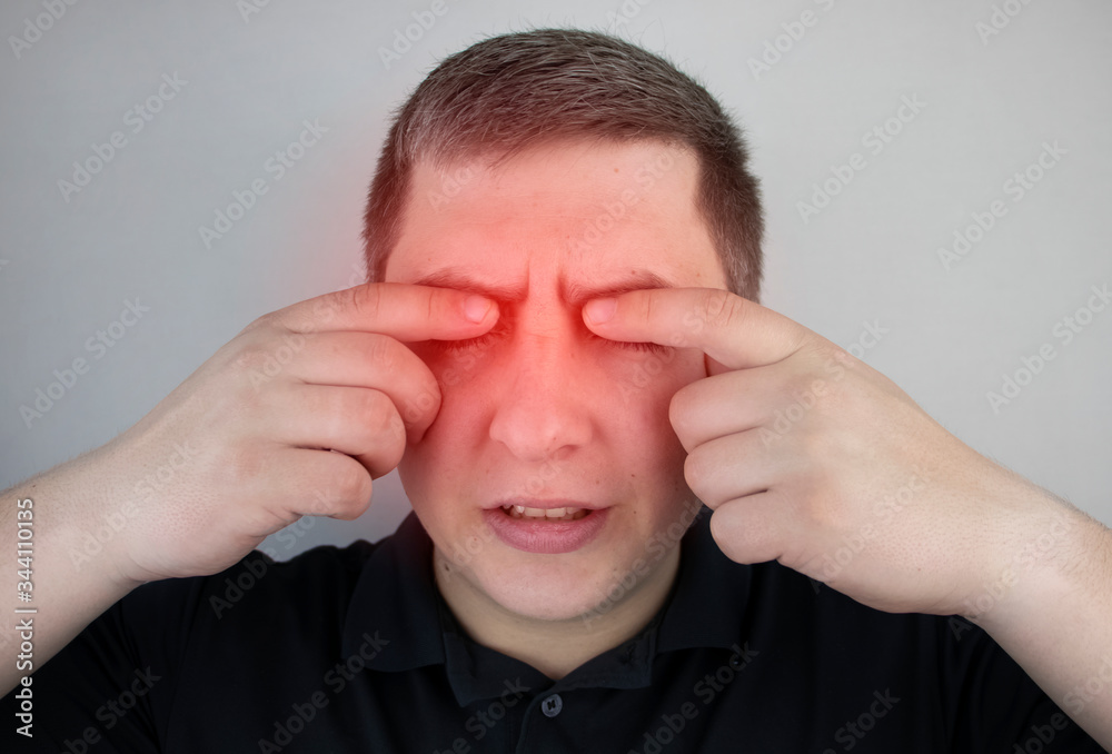 A man suffers from pain in the eye. Patient with ophthalmic disease, uveitis, optic neuritis, conjunctivitis, or eye injury A man suffers from pain in the eye. Patient with ophthalmic disease, uveitis, optic neuritis, conjunctivitis, or eye injury