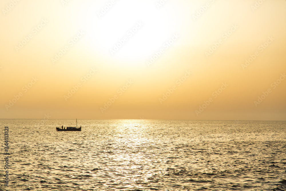 glossy surface reflecting beautiful seascape on the sunset on Gran Canaria island