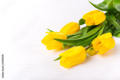 Fototapeta Naklejka Na Ścianę i Meble -  Beautiful tulips on white wooden background