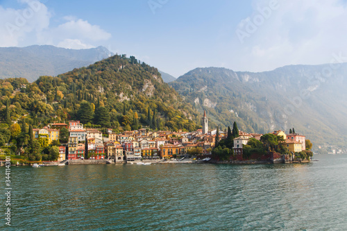 Colorful town Varenna seen from Lake Como on a sunny day