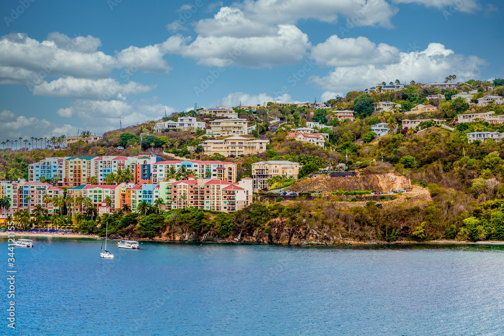 A Colorful Condos on St Thomas with sailboats in bay