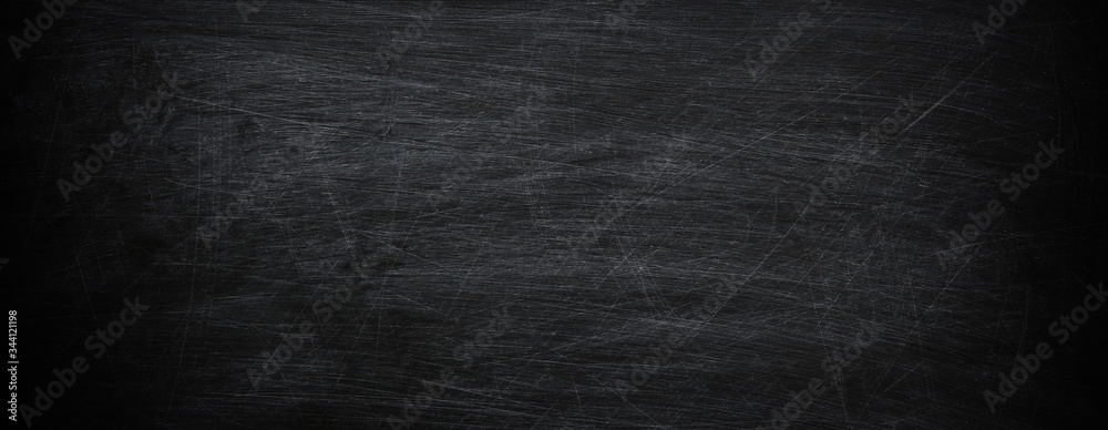 Dark, grunge and scratched chalkboard texture with empty space for text Dark, grunge and scratched chalkboard texture with empty space for text
