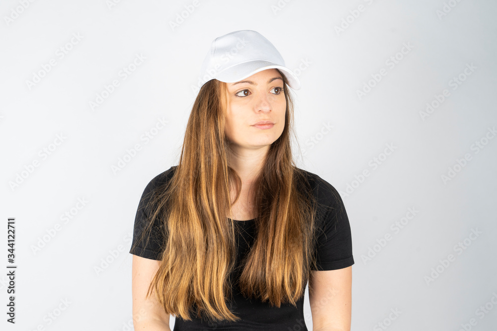 women with plain black t-shirt and hat or cap on white background women with plain black t-shirt and hat or cap on white background