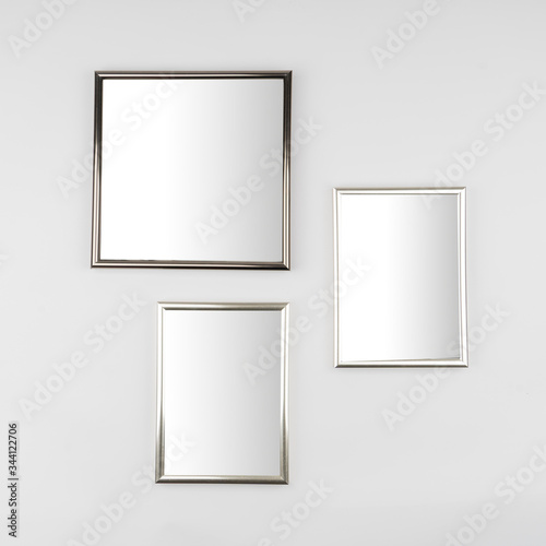 3 plain frames for photos on a wall
