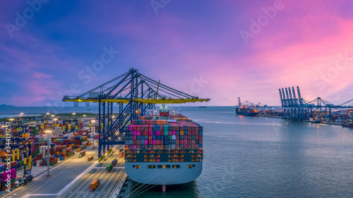 Container cargo ship at industry sea port, import export commerce global business trade logistic and transportation oversea worldwide by container cargo vessel ship boat, Freight shipping maritime. photo
