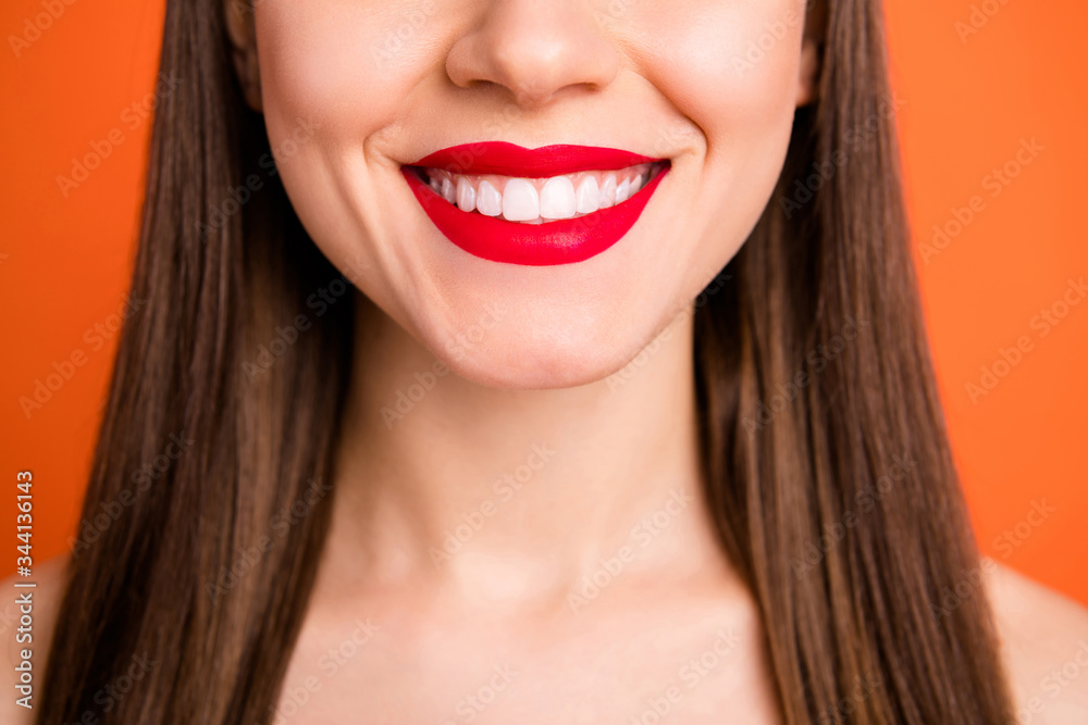 Closeup cropped photo of attractive lady bright red pomade amazing celebrity smile half face dentistry concept isolated vibrant orange color background Closeup cropped photo of attractive lady bright red pomade amazing celebrity smile half face dentistry concept isolated vibrant orange color background