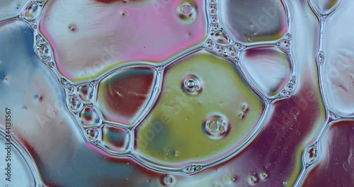 Movement oxygen bubbles in a liquid. Beautiful structure of water in macro a natural background	