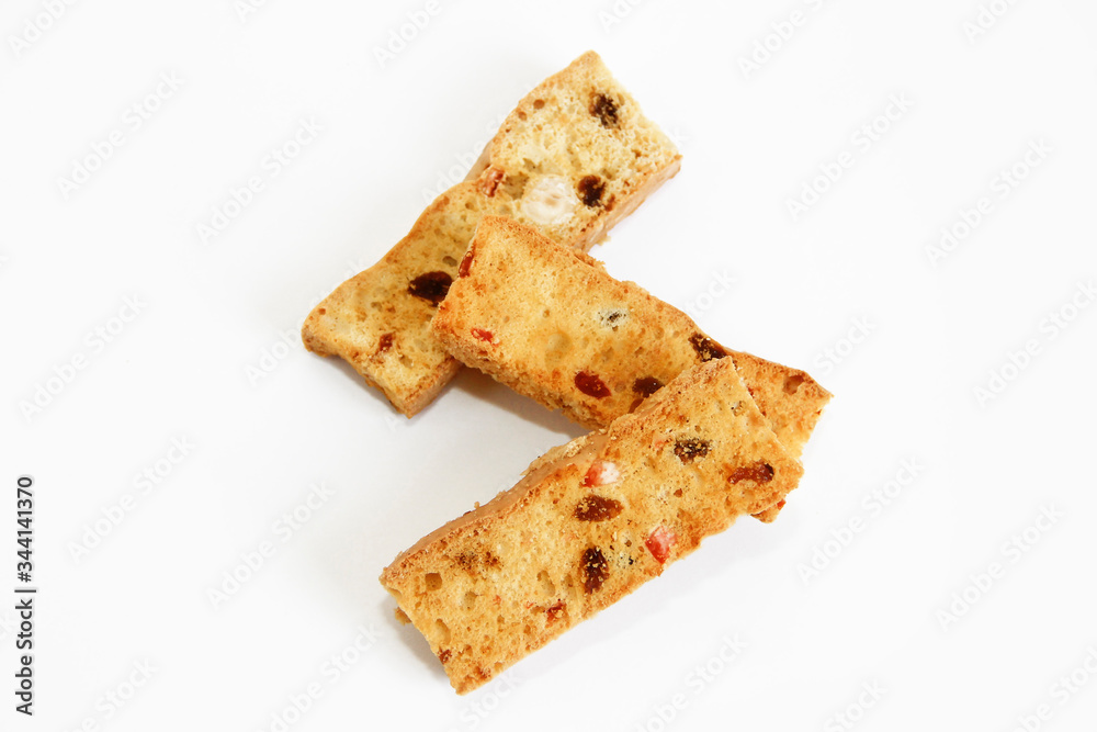 Fototapeta premium white bread crackers with fruit slices on a white background