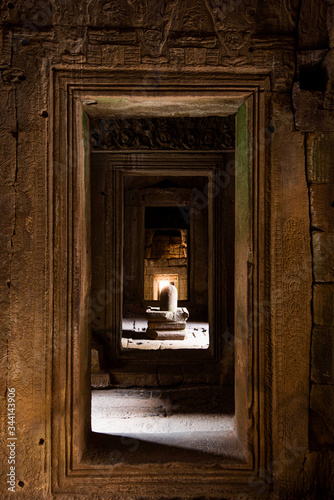 Linga sculpture looked through doorway in Bayon Temple  Angkor Thom  Siem Reap  Cambodia