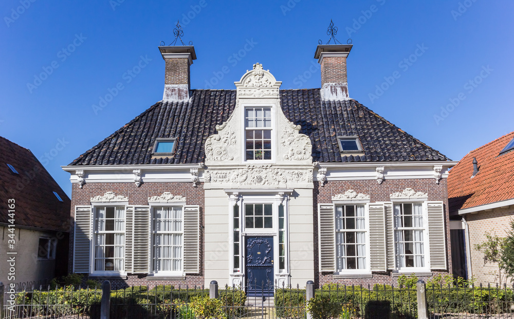 Facade of a historic house in the center of Heeg, Netherlands