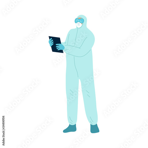 Doctor standing and looking at medical results during pandemic