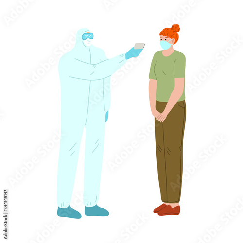 Doctor standing measuring womans temperature with thermal imager during epidemic