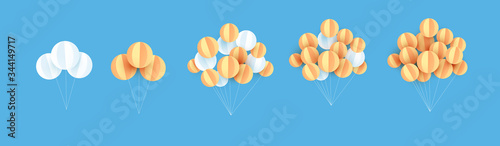 Set of Origami made hot air balloon in a heart shape hang on blue sky.paper art style.