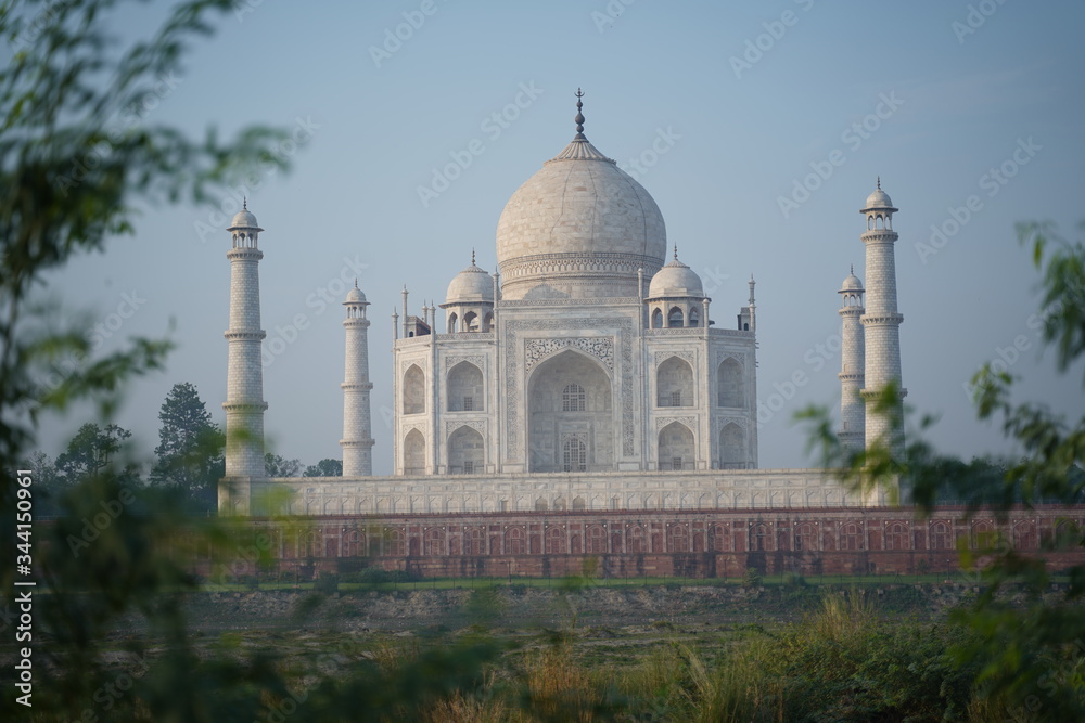 The Taj Mahal is an ivory-white marble mausoleum on the south bank of the Yamuna river in the Indian city of Agra.