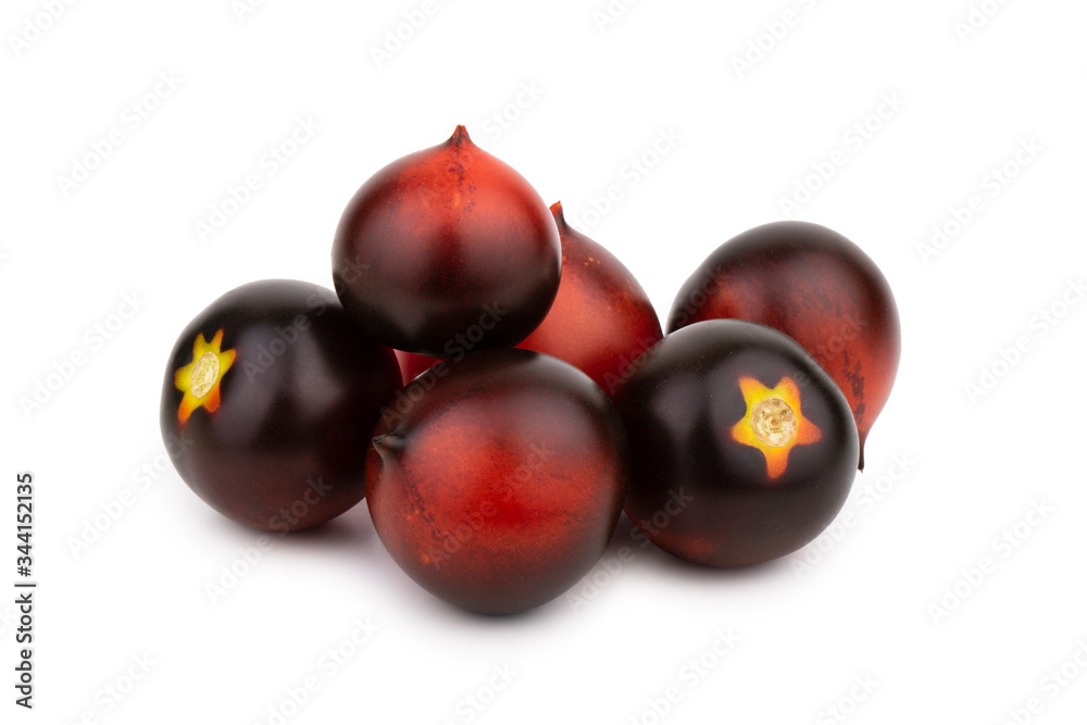 Black and red tomato indigo rose isolated on white background