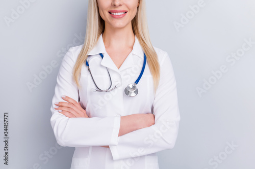 Cropped close-up portrait of her she nice attractive content lovely cheerful cheery blonde girl therapist medic specialist therapy treatment folded arms isolated on grey pastel color background