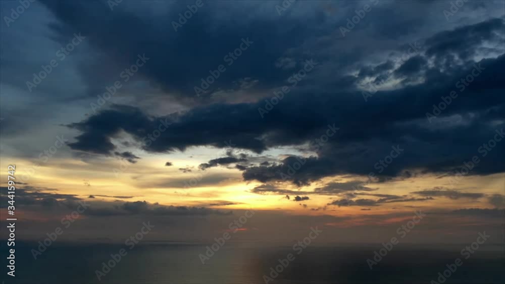 Sunset and clouds over ocean. Aerial hyperlapse video clip Sunset and clouds over ocean. Aerial hyperlapse video clip