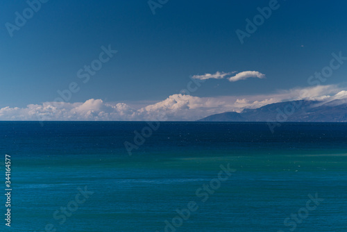 Fototapeta Naklejka Na Ścianę i Meble -  The southern coast of Crimea, Balaklava Bay view in windless cloudy weather from the sea.